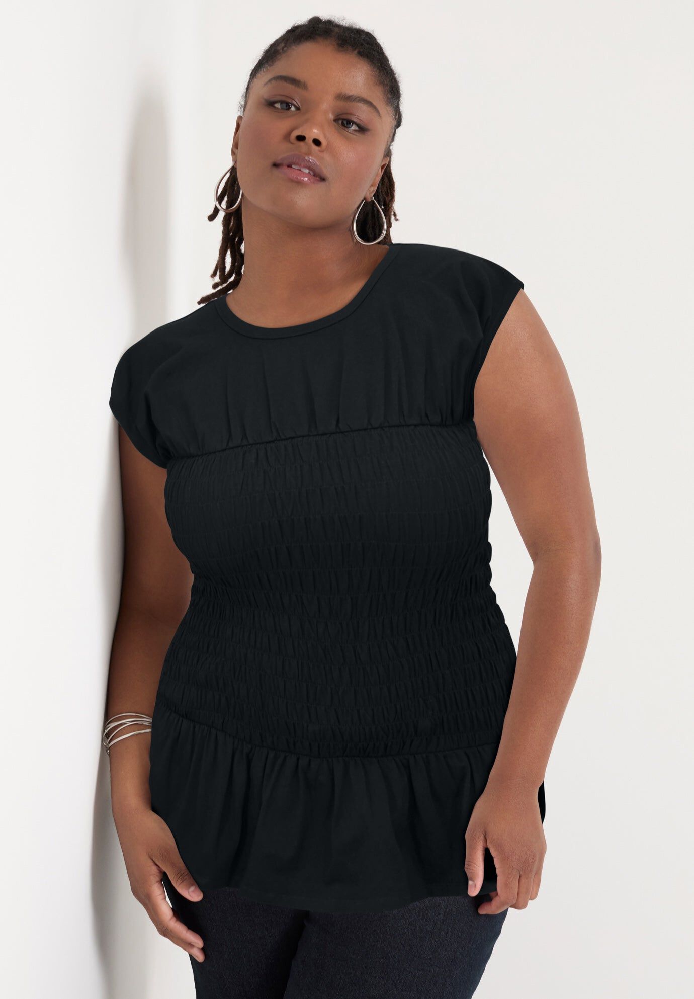 Smocked Peplum Top